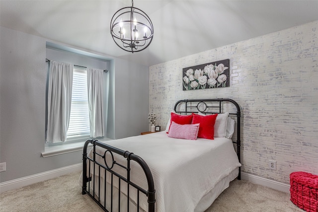 bedroom featuring brick wall, light carpet, and a chandelier