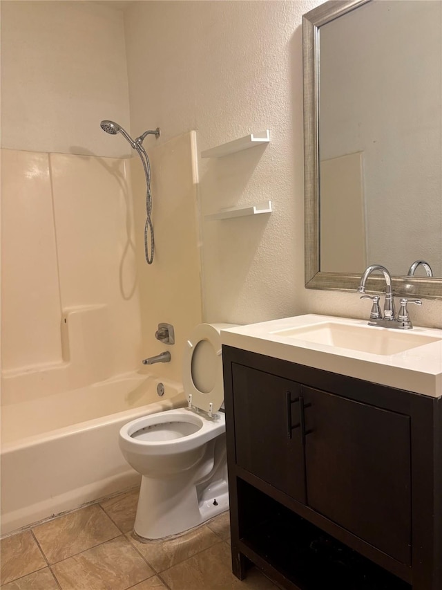 full bathroom featuring vanity, tile patterned flooring, toilet, and shower / bath combination