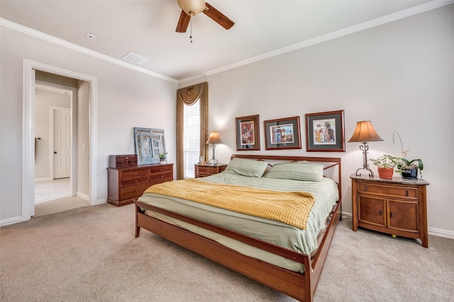 bedroom with crown molding, light colored carpet, and ceiling fan