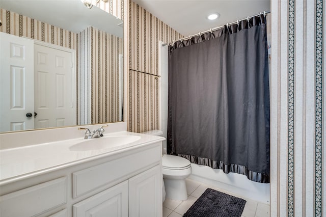 full bathroom featuring tile patterned flooring, shower / bath combo, vanity, and toilet