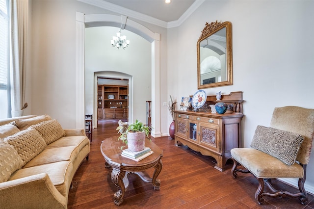 interior space featuring crown molding, dark hardwood / wood-style floors, and a notable chandelier