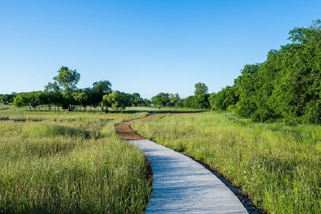 view of community with a rural view