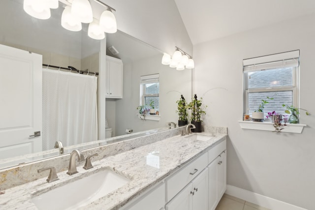 bathroom featuring a shower with curtain, tile patterned floors, vanity, and vaulted ceiling