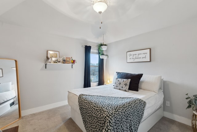 bedroom with light carpet and ceiling fan