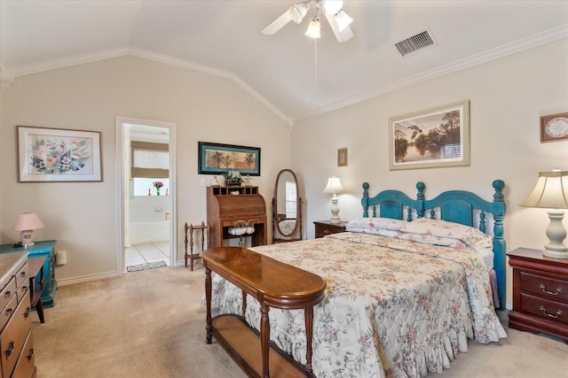 carpeted bedroom with crown molding, lofted ceiling, connected bathroom, and ceiling fan