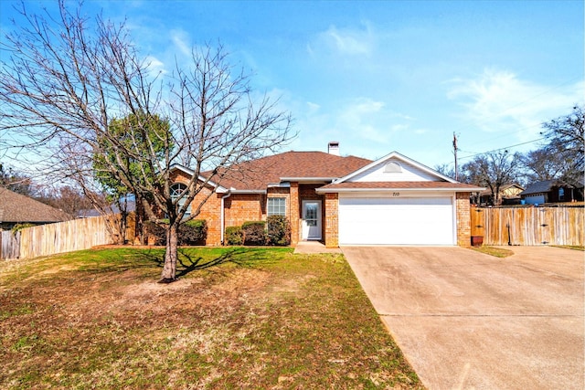 ranch-style home with a garage and a front lawn