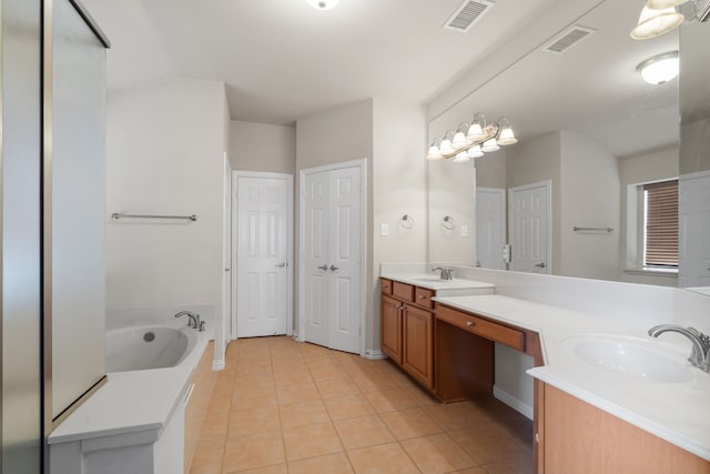 full bathroom with tile patterned floors, double vanity, visible vents, and a sink