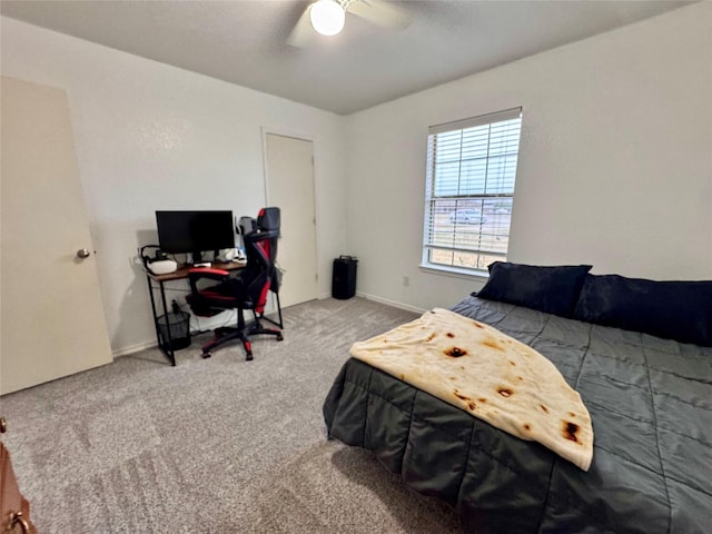 bedroom featuring ceiling fan and carpet floors