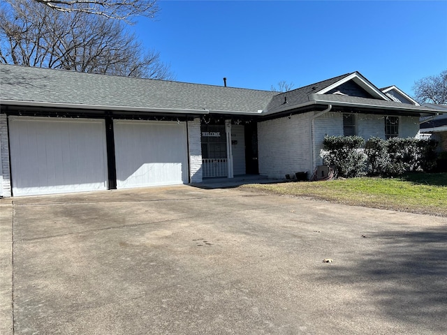 ranch-style home with a garage