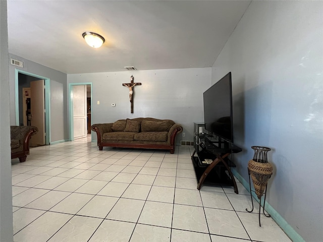 living room featuring light tile patterned floors