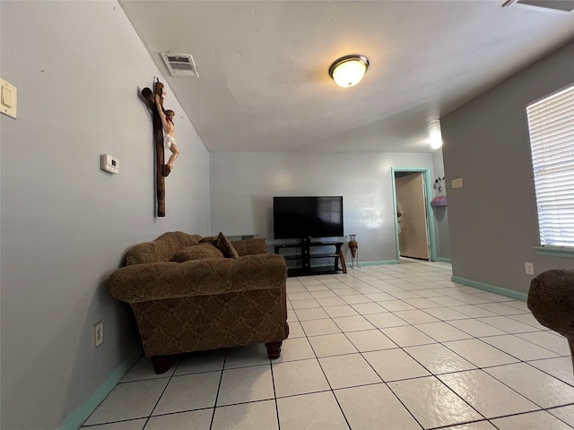 living room featuring light tile patterned floors