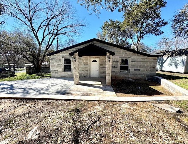 view of front of house with a patio area