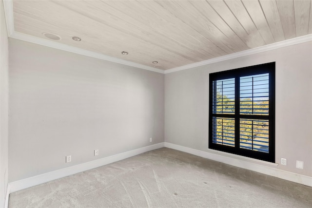 spare room with crown molding, wood ceiling, and light carpet