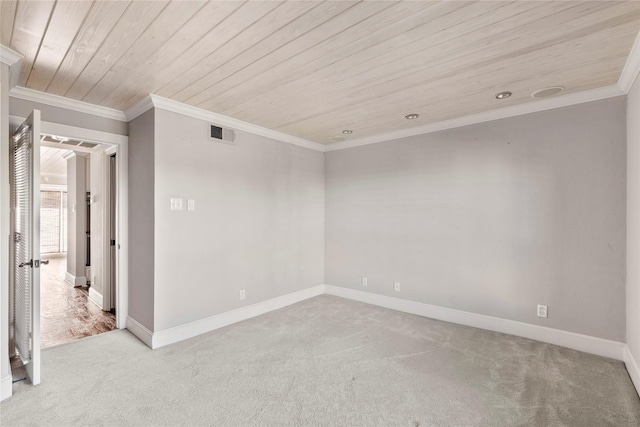 unfurnished room with ornamental molding, light colored carpet, and wooden ceiling