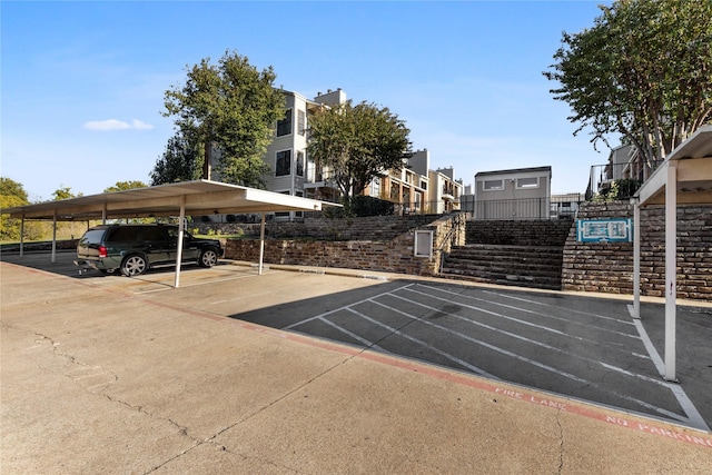 view of car parking with a carport