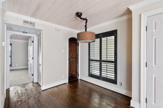 empty room featuring crown molding, dark hardwood / wood-style floors, and wooden ceiling