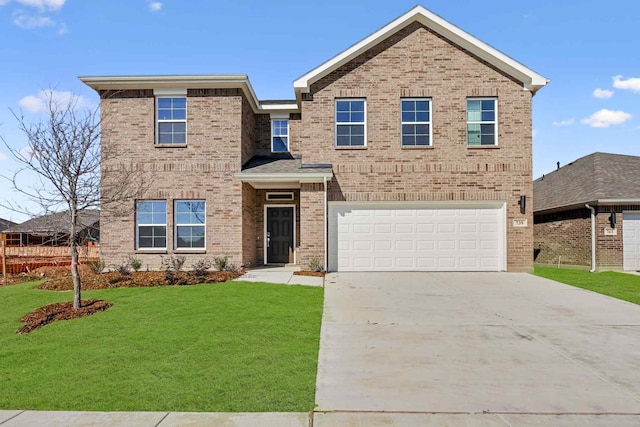 view of front facade featuring a garage and a front yard