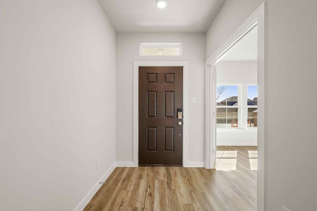 foyer with light hardwood / wood-style flooring