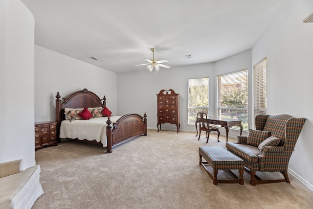 bedroom with light colored carpet and ceiling fan