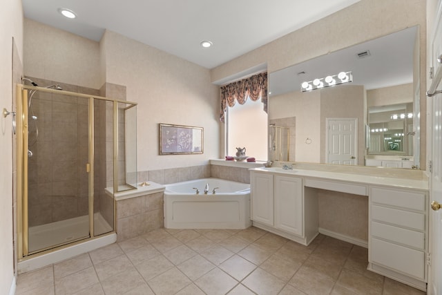 bathroom with tile patterned floors, vanity, and independent shower and bath