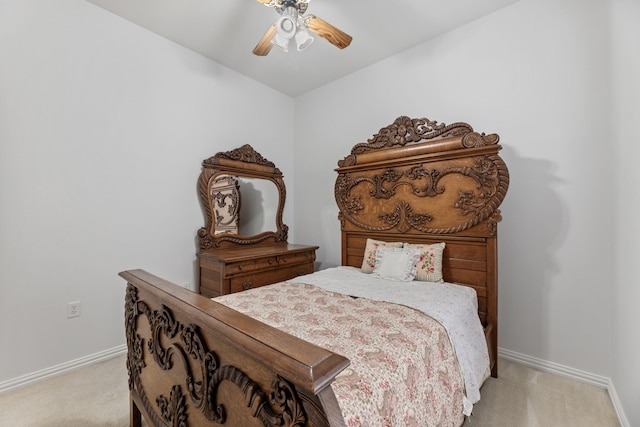 bedroom with light colored carpet and ceiling fan