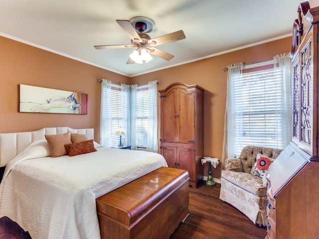 bedroom featuring crown molding, ceiling fan, and dark hardwood / wood-style floors