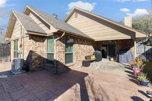 view of patio with ac unit and grilling area