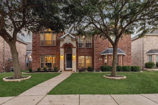 view of front of home with a front yard