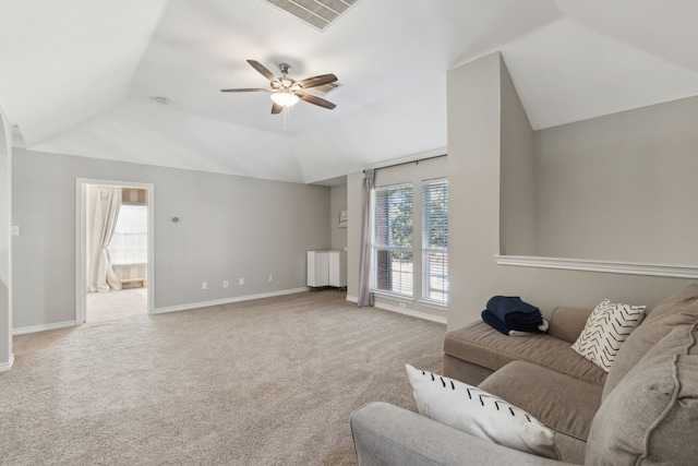 living room with lofted ceiling, light carpet, and ceiling fan