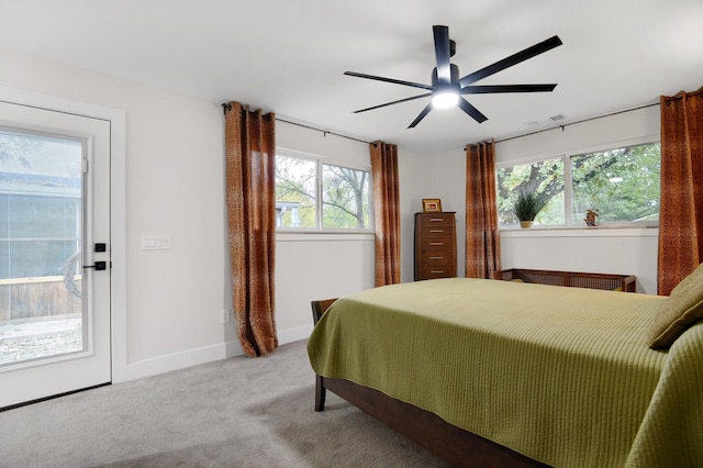 bedroom featuring light carpet and ceiling fan