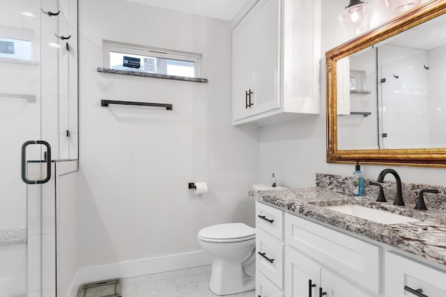 bathroom with walk in shower, vanity, and toilet