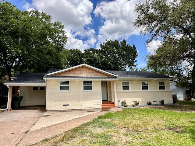 ranch-style home with a front yard