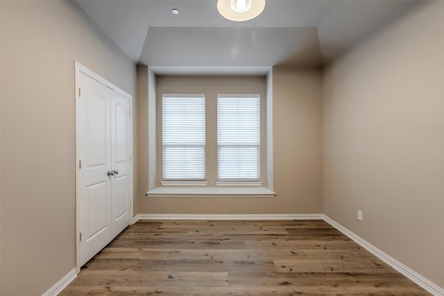 spare room featuring light hardwood / wood-style flooring