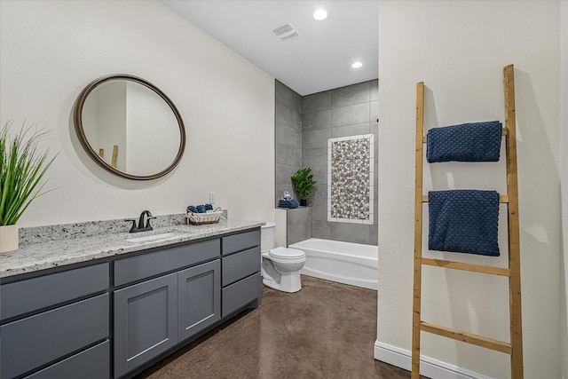 full bathroom with tiled shower / bath combo, vanity, and toilet