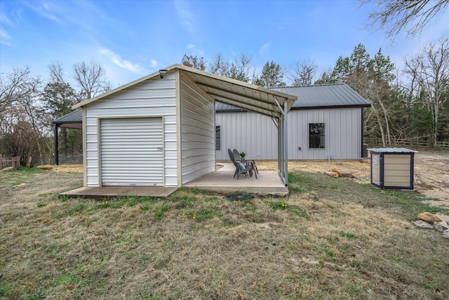 view of outdoor structure featuring a garage