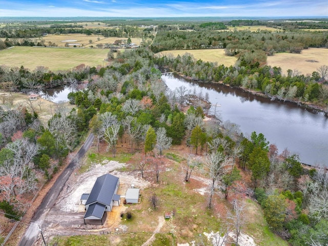 drone / aerial view featuring a water view and a rural view