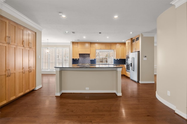 kitchen featuring tasteful backsplash, hanging light fixtures, dark hardwood / wood-style floors, and appliances with stainless steel finishes