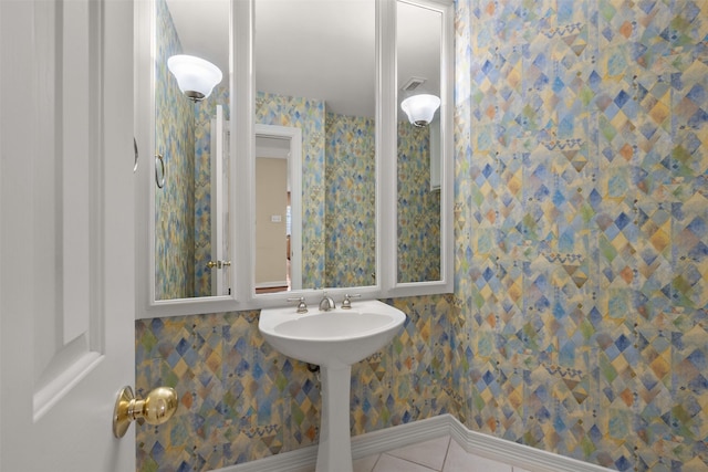 bathroom with tile patterned flooring