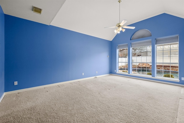 carpeted empty room featuring ceiling fan and high vaulted ceiling