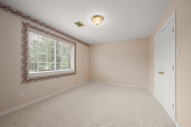 view of carpeted spare room