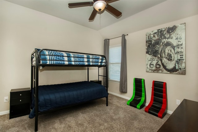 carpeted bedroom featuring lofted ceiling and ceiling fan