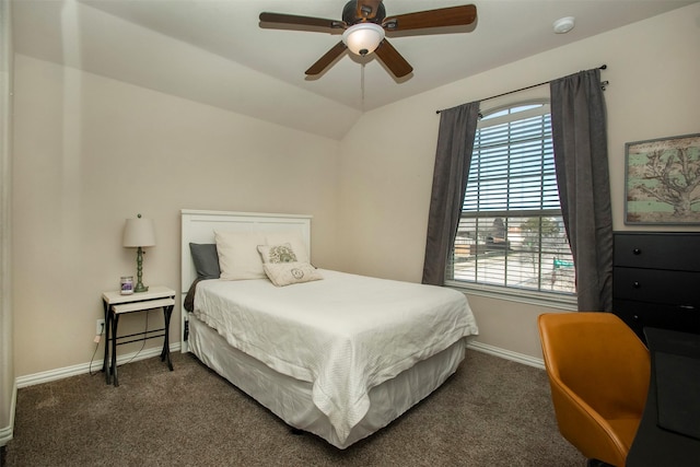 carpeted bedroom featuring vaulted ceiling and ceiling fan