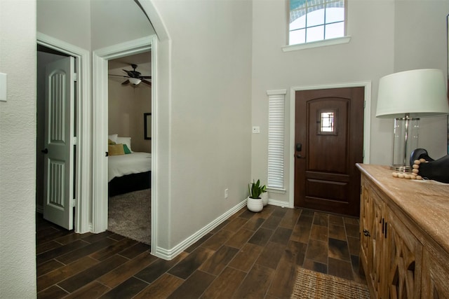 entryway featuring ceiling fan