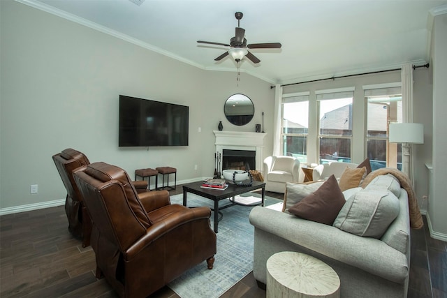 living room with ceiling fan, ornamental molding, and dark hardwood / wood-style flooring