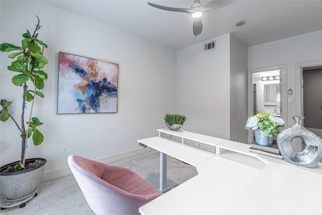 interior space with ceiling fan