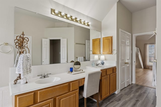 bathroom featuring vanity and wood-type flooring