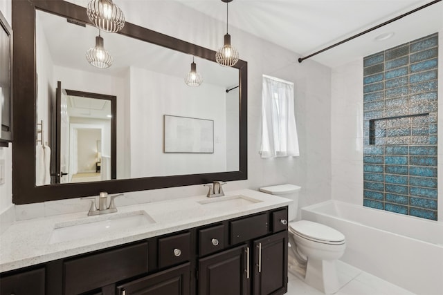 full bathroom featuring toilet, double vanity, shower / washtub combination, and a sink