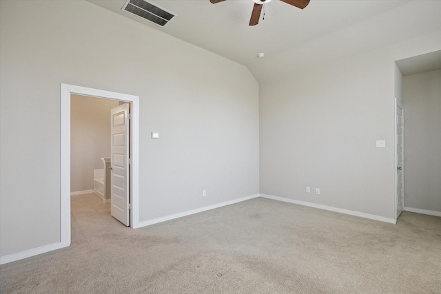 empty room featuring visible vents, carpet flooring, and ceiling fan