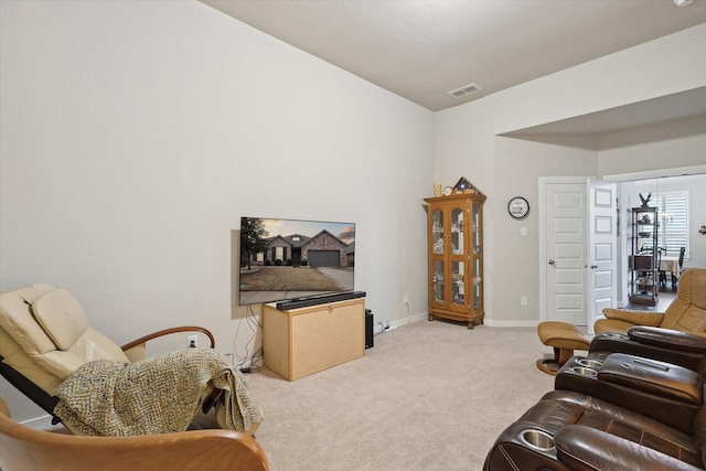 living room with light carpet