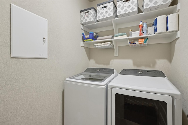 laundry area with washer and dryer and laundry area